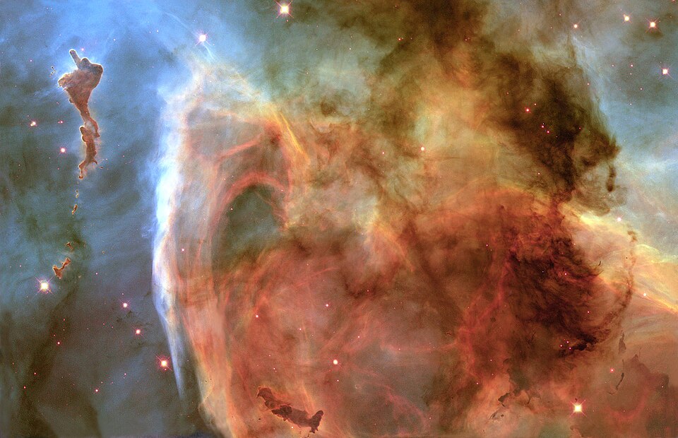 Deep space nebula with dust pillars and bright stars