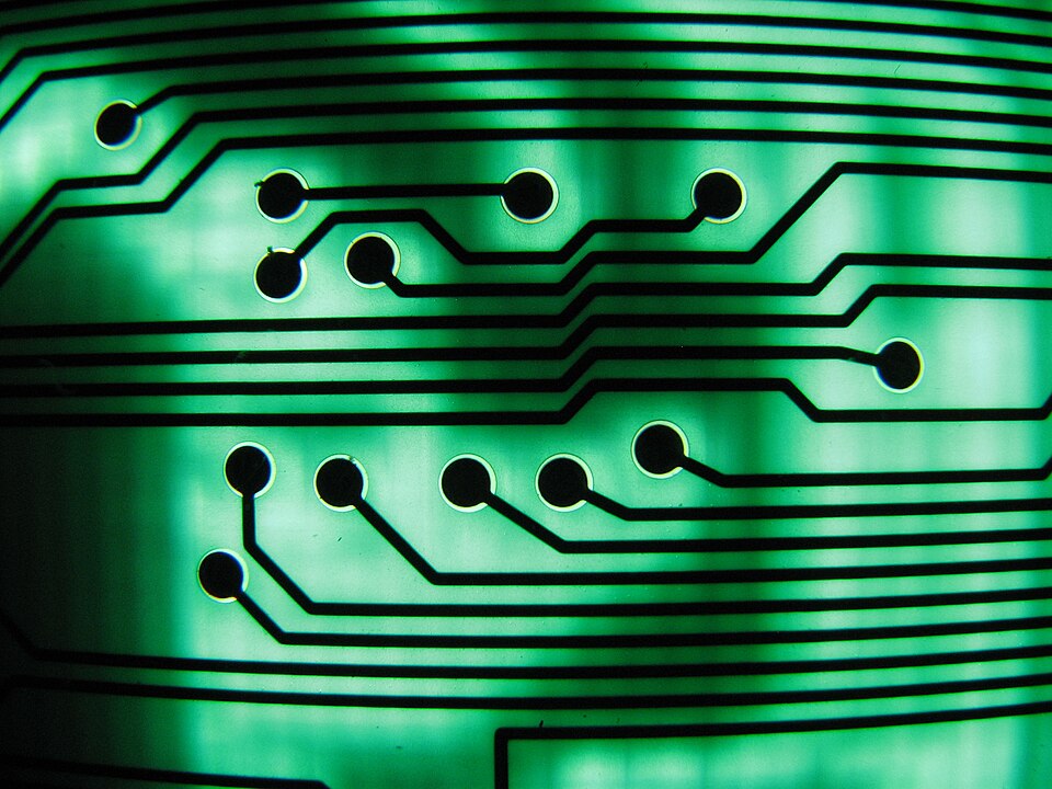 Macro photograph of a green printed circuit board
